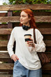 © Bliss - Capturing a moment of relaxation with coffee on a sunny afternoon in the park