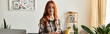 © Bliss - Young woman enjoying her spare time with a warm drink in a stylish indoor setting