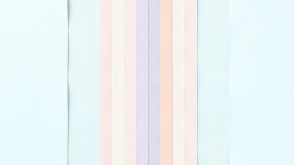 Poster - Delicate pastel hued papers cascade in a simple and soft vertical arrangement on a serene light blue backdrop