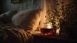 © feng - Gentle light casting on herbal tea by bedside, creating a calming nighttime scene, tea relaxation sleep. High quality