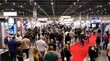 © Valentyna - Crowd of people walking at an exhibition, exploring new brands and companies, and experiencing the vibrant atmosphere of this business event