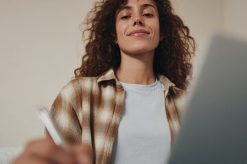 Aufkleber - Modern digital checklist completion on laptop screen with young woman interacting, showcasing efficient online workflow and user engagement in workspace