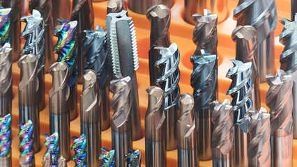 Poster - various types of drill bitsmilling cutter . display is organized and bits are arranged in a way that makes it easy to see the differences between them