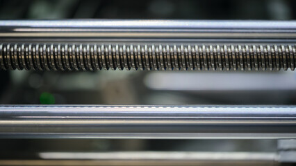 Poster - Screw drive as part of industrial machine or conveyor, industrial concept background.