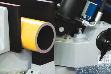 Aufkleber - automatic circular saw cutting large metal part with round cross-section, industrial concept background.
