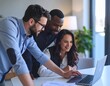 © Ibnu - Team of Two Male Colleagues and Female Coworker Collaborating at a Laptop – Modern Office Business Environment