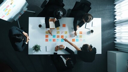 Poster - Time lapse of business people brainstorm and share business idea. Top down aerial view of businessman writing marketing strategy on whiteboard while explain plan to executive manager. Directorate.