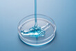 © ADDICTIVE STOCK - Viscous liquid in petri dish for cosmetic testing