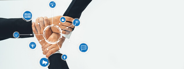 Poster - This image captures the essence of teamwork with diverse hands coming together amidst technology icons, representing communication, growth, and synergy in a professional setting. Amity