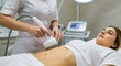 © Bocx - Woman receiving non-invasive body treatment