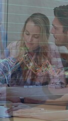 Poster - Animation of graphs over happy diverse businesspeople working with laptop in office