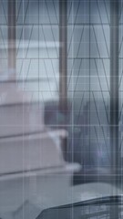 Poster - Animation of multiple graphs and books on table over time lapse of walking people against window