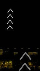 Poster - Animation of multiple up arrows over aerial view of illuminated modern building against night sky