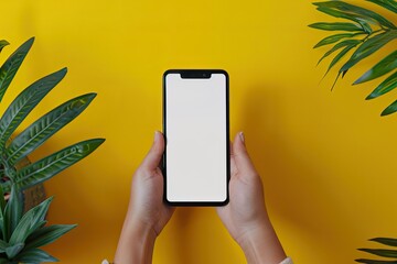 Vibrant Picture of Hands Holding Modern Smart Phone Mockup, Yellow Background