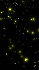 Poster - Animation of glowing spots of yellow light on black background