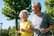© tai - Elderly Couple Enjoying Outdoor Exercise