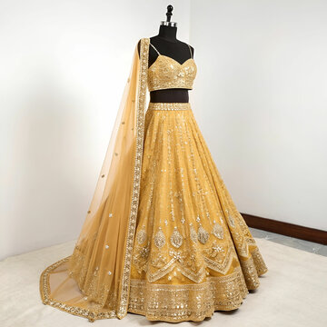 Golden lehenga isolated on white background.