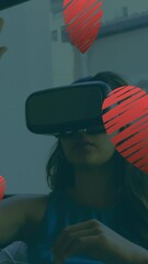 Poster - Animation of falling hearts over caucasian woman using vr headset