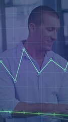 Poster - Animation of dots forming graph over grid pattern against caucasian man standing and using laptop