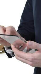 Poster - Animation of businessman using clear smartphone with stacks of boxes on white background