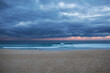 © Austockphoto - Sunset storm at beach