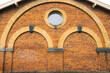 © Austockphoto - Curved brickwork and arches on a building