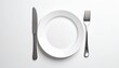 © DreamGrid - knife and fork on white plate with white background