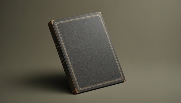 Dark gray book with gold-tone detailing.