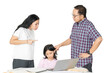 © Creativa Images - Parents Disciplining Daughter During Online Learning at Home