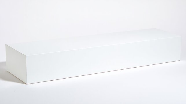 White rectangle object on smooth surface, showcasing modern minimal design