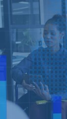 Poster - Animation of multiple graphs over diverse businesswoman on wheelchair explaining to colleagues