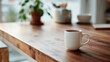 © Jinling - Minimalist wooden desk with coffee cup, a serene workspace for focused productivity