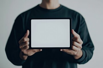 Fototapete - Clear Pixel Picture of Front View of Man Holding Tablet Mock Up