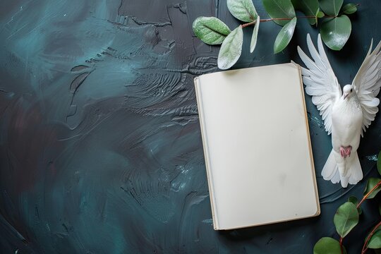 High Quality Picture of Top View of Notebook with Paper Dove