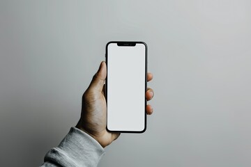 Poster - Pixel Perfect Picture of Male Hand Holding a Phone with a White Screen on the White Background