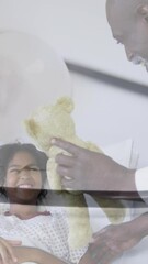 Poster - Animation of stethoscope over african american doctor and patient