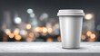 © Riniphoto - White Coffee Cup on Marble Table with Blurry City Lights Background.