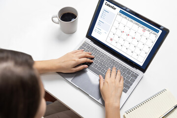 Fototapete - Calendar on computer software application for brisk schedule planning for personal organizer and online business