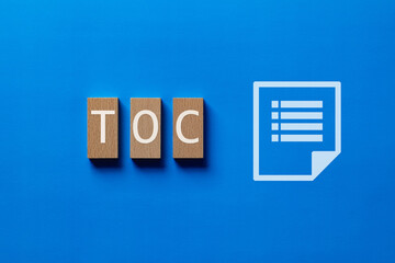 Poster - There is wood block with the word TOC. It is an abbreviation for Theory Of Constraints as eye-catching image.