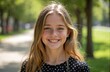 © Vadym - Portrait teenage girl smiling happily in city park. Young caucasian female with blond hair freckles, happy look. Child smiles, expresses joy, enjoys lifestyle. Portrait captures happiness, beauty,