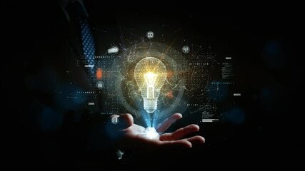 Poster - bright lightbulb icon symbolizing innovation and ideas, floating above a businessman’s hand with dig