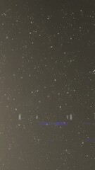 Poster - Animation of glowing spots of lights over dark background