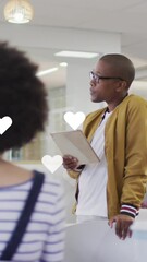 Poster - Animation of hearts over diverse business people in office