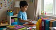 © Ganang - Young boy engaged in focused study at his desk.