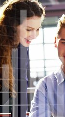 Poster - Animation of data processing over caucasian man and woman smiling looking at laptop at office