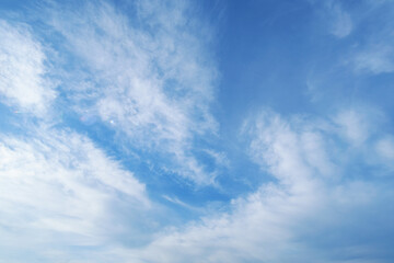 Wall Mural - beautiful blue sky with soft white clouds for abstract background