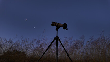 Wall Mural - lens and camera for photographing moon, stars, milky way and other celestial bodies from rural count
