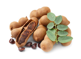 Wall Mural - Heap of tasty tamarinds, seeds and leaf on white background
