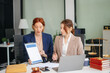 © laddawan - business people and lawyers discussing contract papers sitting at the table. Concepts of law, advice, legal services.