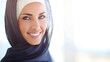 © SM - Young Arab businesswoman smiling with confidence, representing modern professionalism and self-assurance.